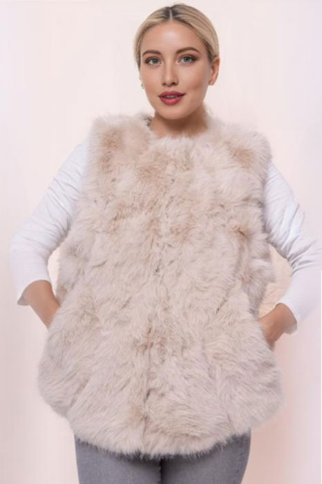 Vesta Pufoasa Shopika - Căldură și Eleganță