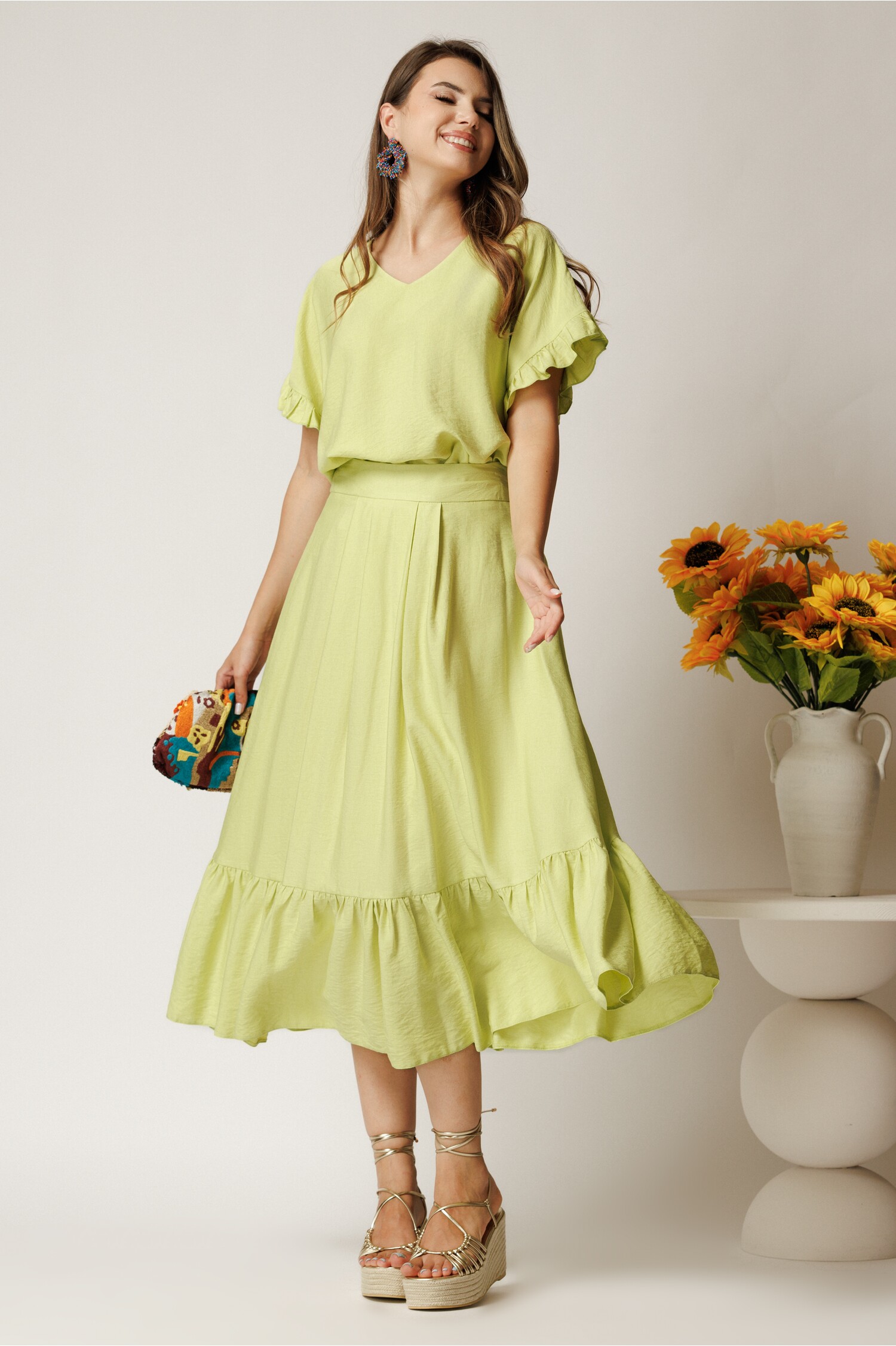 Fusta midi verde clos cu volan | Design elegant