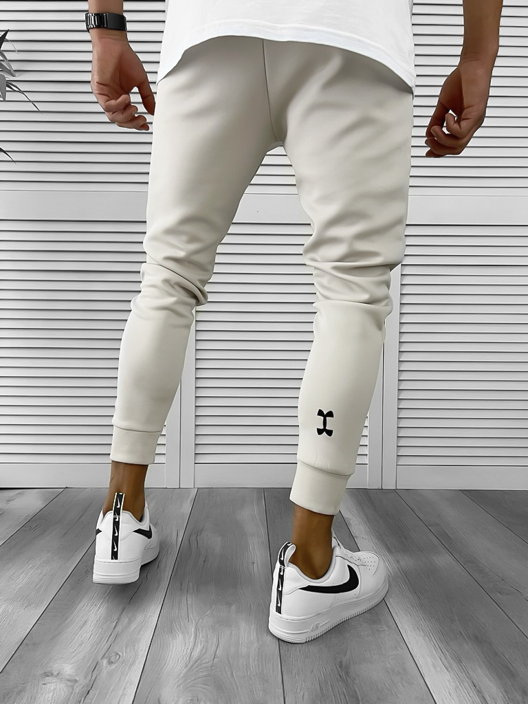Pantaloni Trening Conici Bej - Stil și Confort